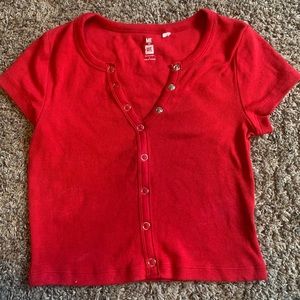 Red PacSun snap from T-shirt